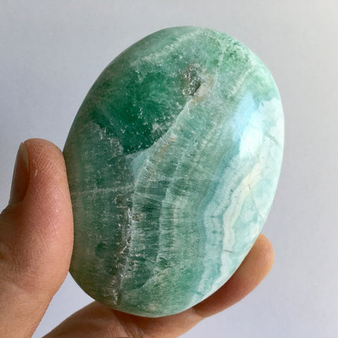 Pistachio Aragonite Palm Stone - 31.99