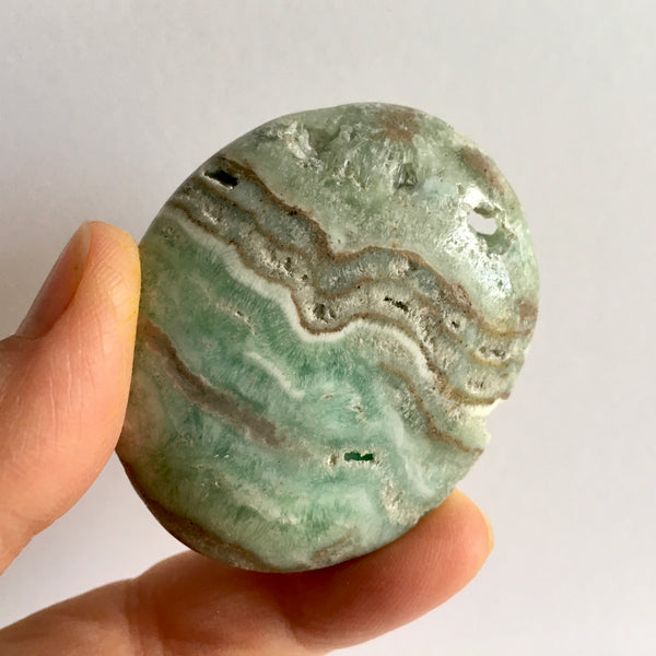 Pistachio Aragonite Palm Stone - 20.99