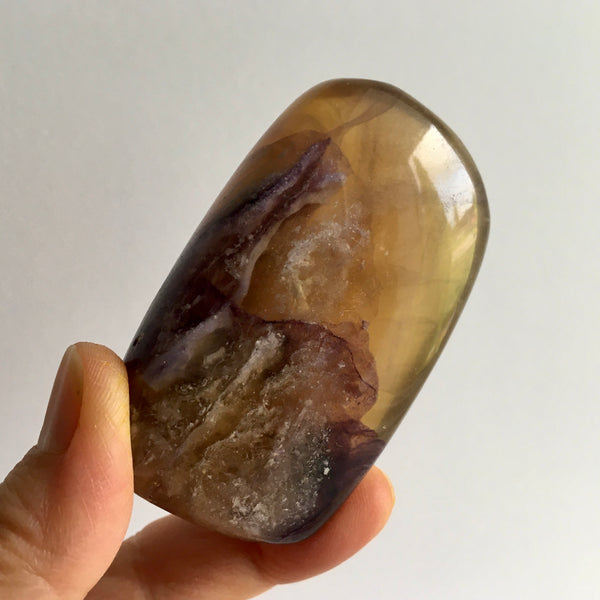 Yellow Violet Fluorite Palm Stone - 35.99
